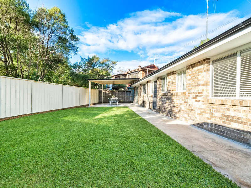 Single Level Brick Home with Fantastic Backyard