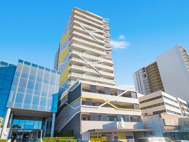 Luxurious 1-Bed + Study Apartment in Burwood: City Views, Parking, and Elegance