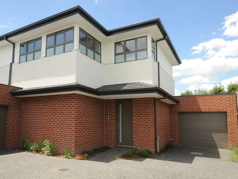 Quality Townhouse with Low Maintenance Living in a Premier Location