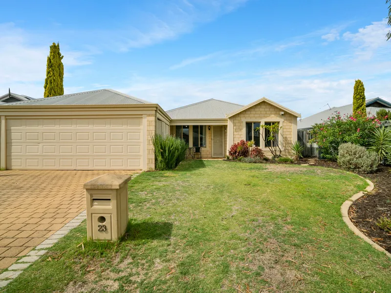 Impressive four-bedroom, two-bathroom family home with updated features throughout.