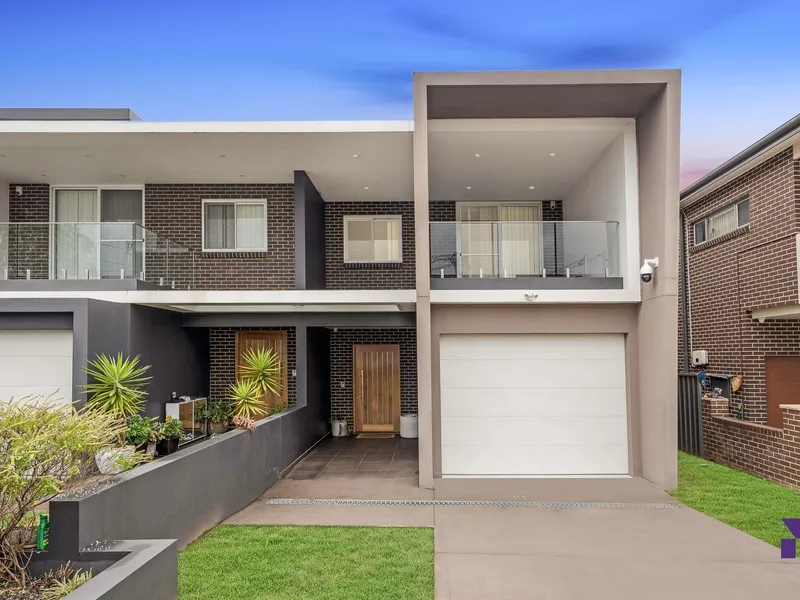 Contemporary full brick family home or investment unveils architectural flair in quiet cul de sac pocket