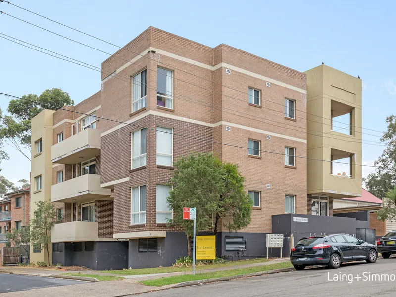 TWO BEDROOM UNIT WITH NEW PAINT AND FLOORS