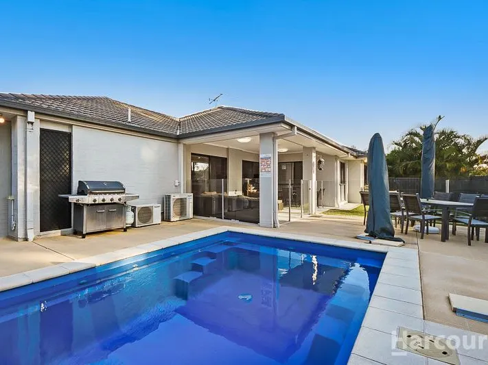 Quality Home with Multiple Living Areas and Pool!