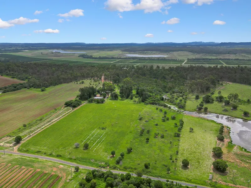 Rare Opportunity Awaits Along The River