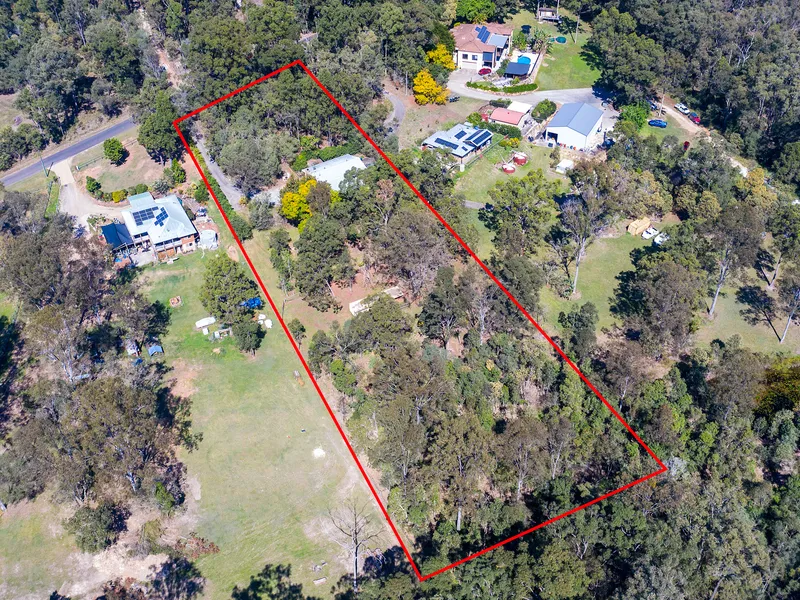 Charming Acreage Retreat with Expansive Deck Overlooking Multiple Paddocks