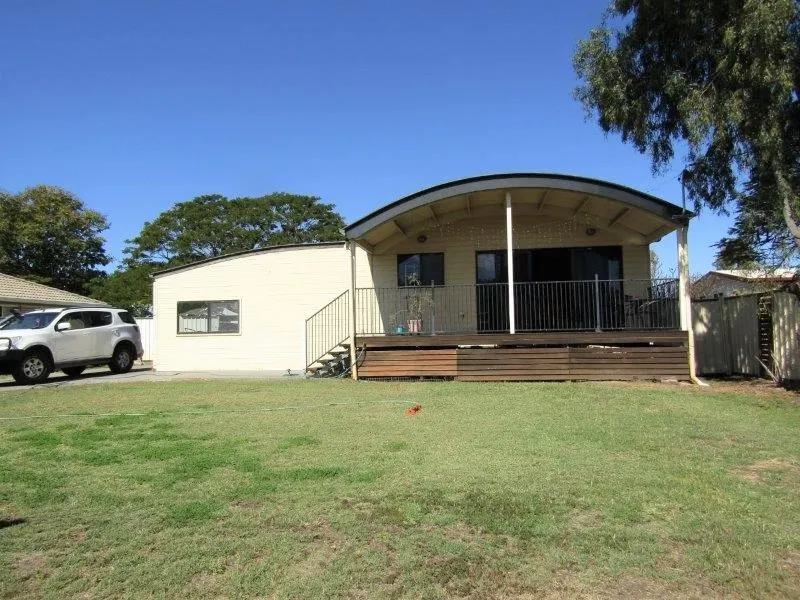 EXCELLENT CAR PARKING DOUBLES AS GREAT ENTERTAINMENT AREA - GORGEOUS HOME WITH FRONT DECK