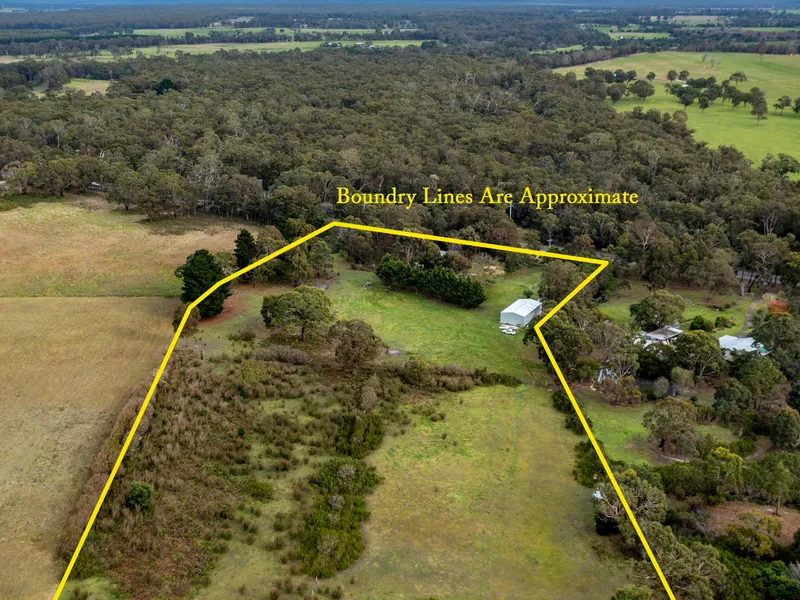 TRANQUIL ACREAGE WITH APPEALING SPACIOUS HOME-