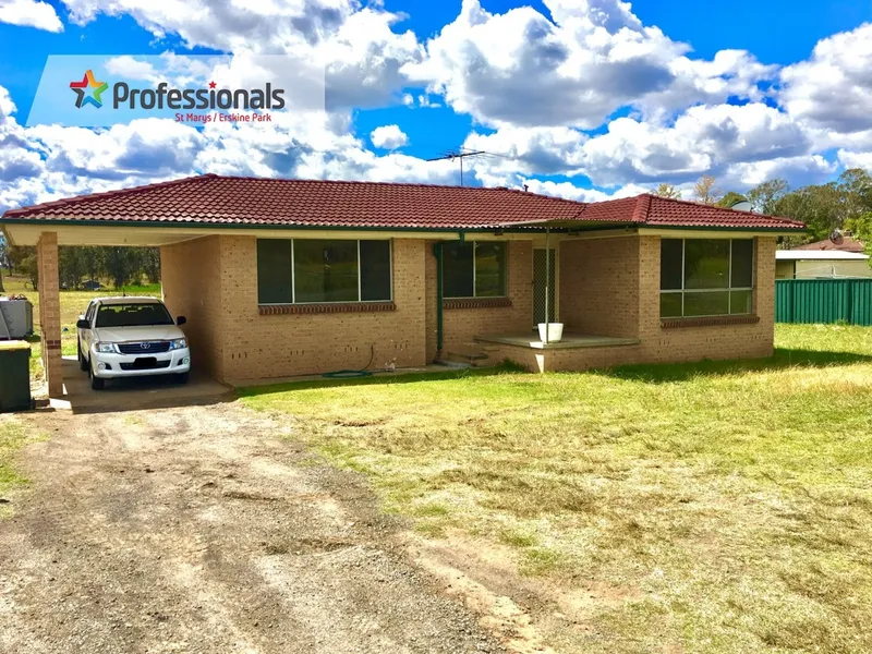 3 Bedroom home with large garage/ work shed