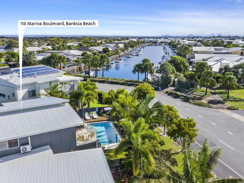 STUNNING DESIGNER HOME WITH CANAL VIEWS ON MARINA BOULEVARD