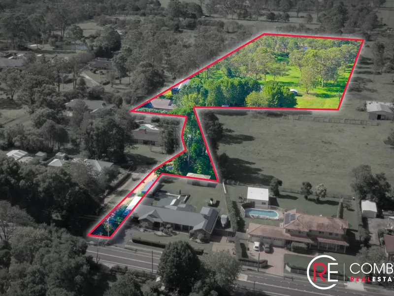 6.89 ACRES + 6 BEDROOMS + ENCLOSED DRESSAGE HORSE ARENA.