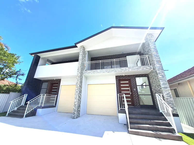 Introducing a stunning and newly constructed duplex with a double lock-up garage.