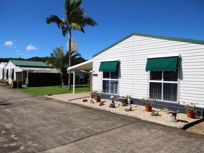 Rare opportunity to purchase an affordable 2 bedroom home ideally situated next to a delightful garden area with no close neighbours on one side.