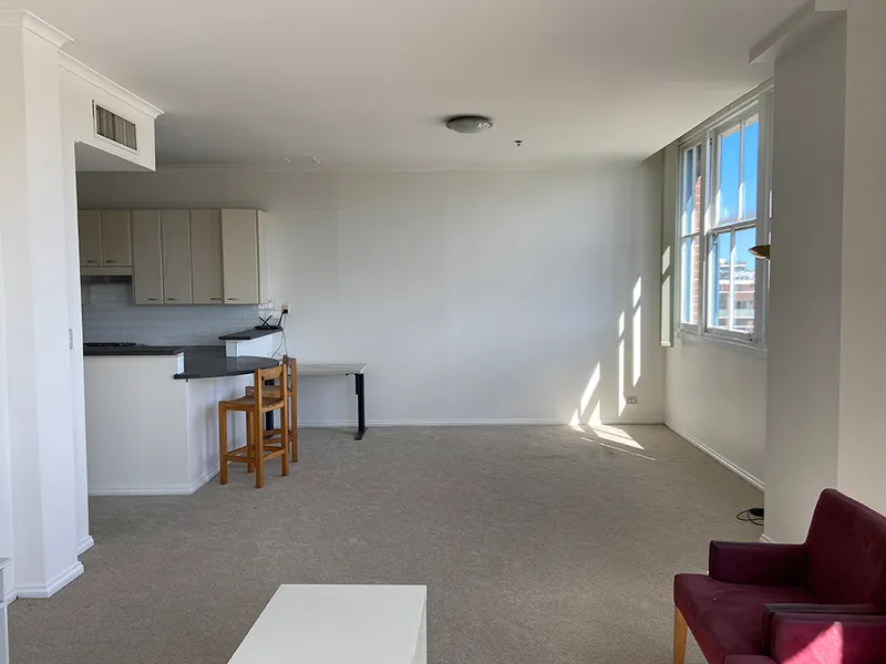 Partially furnished, high ceilings and well-lit!