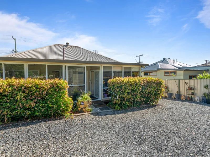 City Oasis with Side Access and Secure Yard