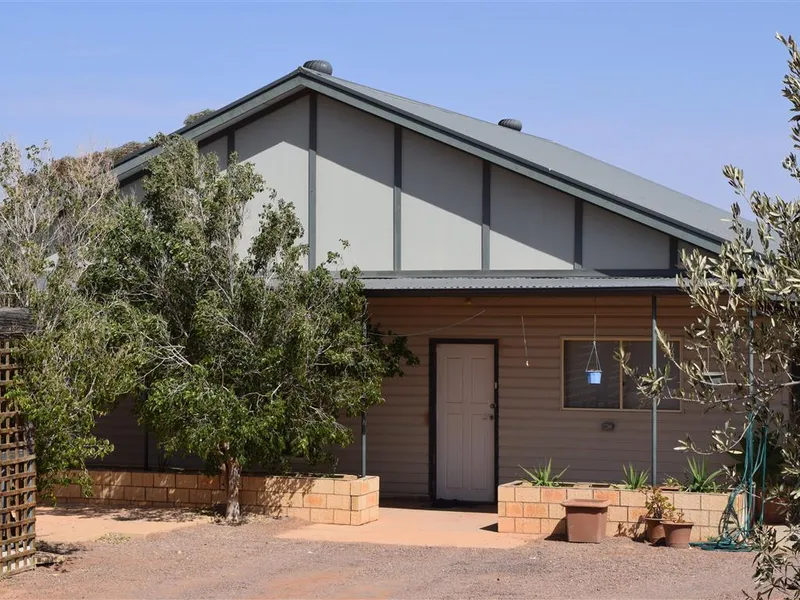 Four Bedroom Family Home with Shed/Home office situated at the lower end of the main street