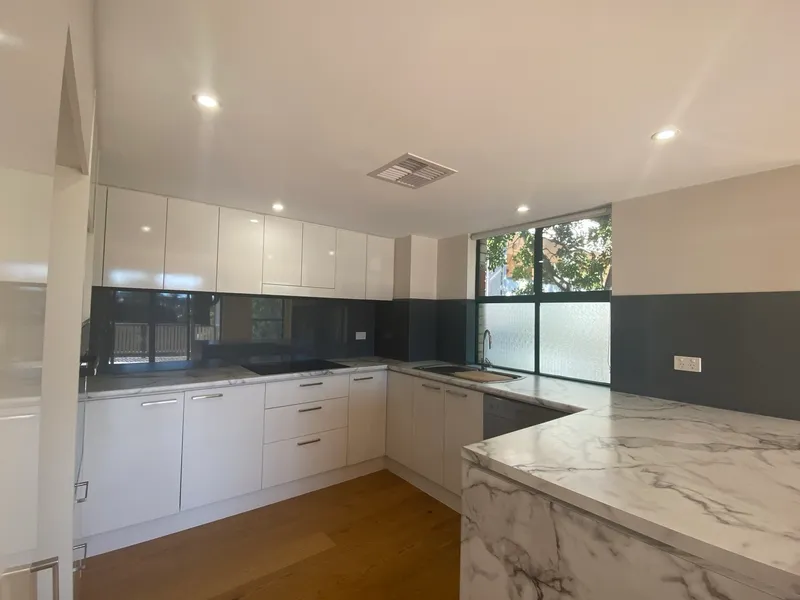 Immaculate Elevated Townhouse