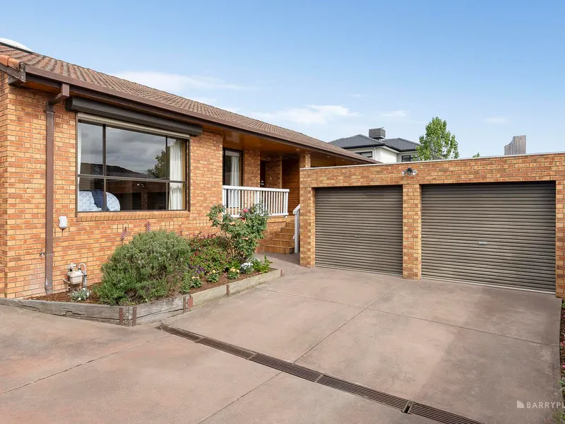 Rare single-level townhouse living.