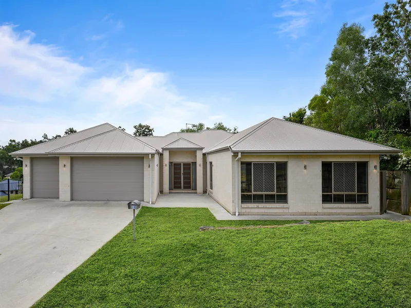 Spacious, elevated and modern 5 bedroom custom designed family home, with breath taking views to the Western Ranges located in an exclusive street