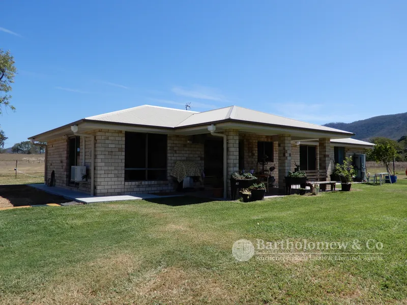 Quality Acreage With Near New Brick Home