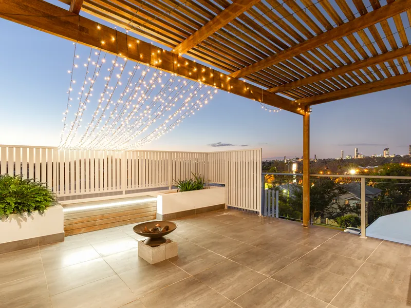 Luxury penthouse with an exclusive rooftop terrace and city views