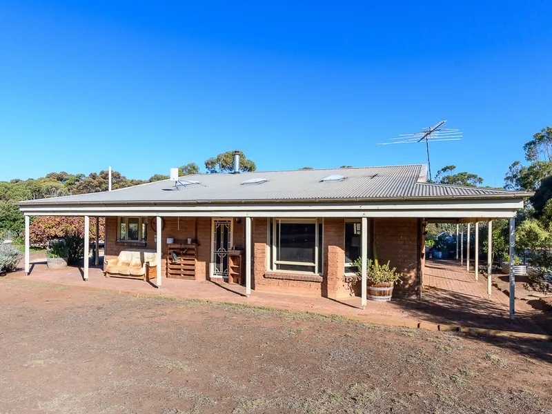 Picturesque and peaceful living set on five acres