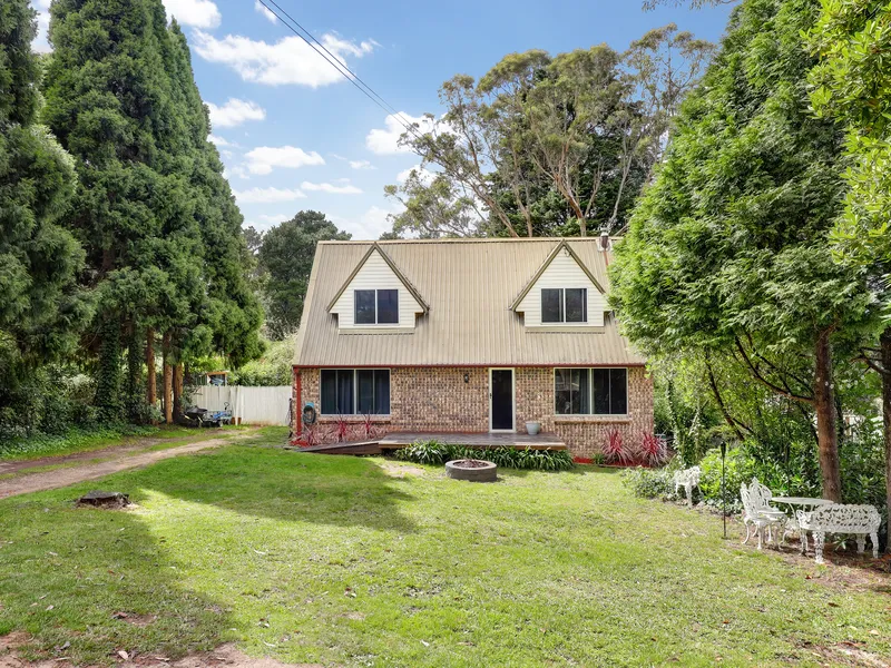 Two storey home on large level block