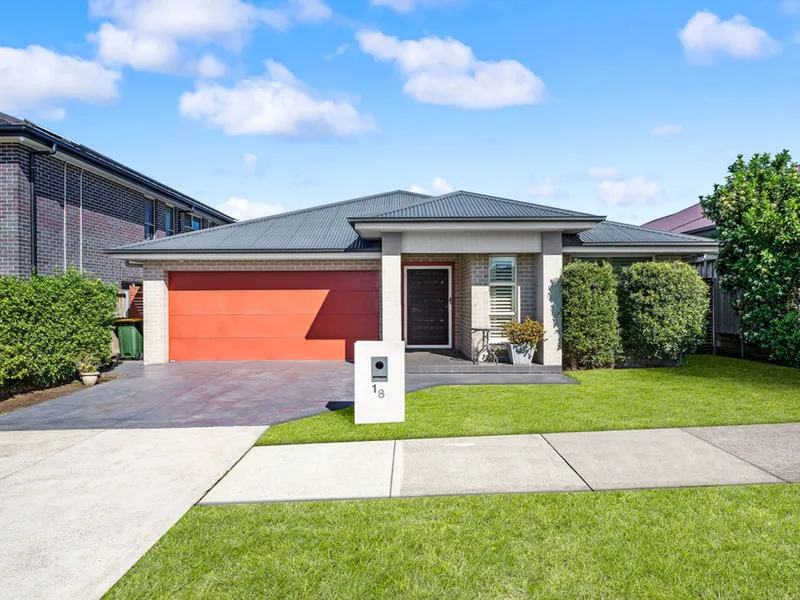 Ideal Family Home on a generous Gledswood Hills Block at 18 Eaglerange Avenue!