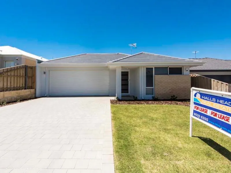 Stroll to Beach from this well located modern home