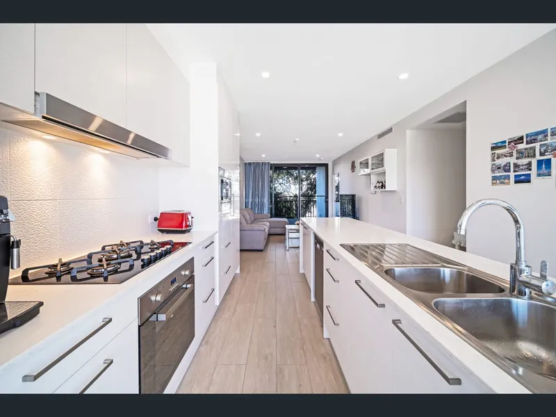 2 Beds! Never Lived in & Offering The Ultimate Location!
