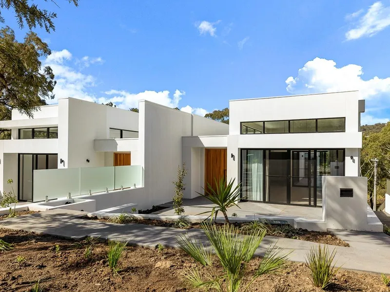 Stunning Townhomes with treetop vistas in a cul de sac location