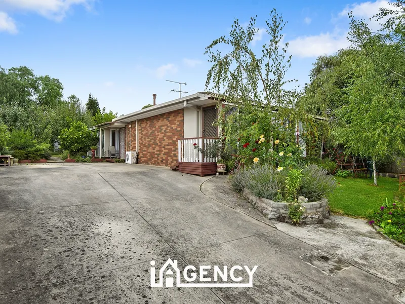 FAMILY FRIENDLY HOME WITH LOTS OF POTENTIAL!!