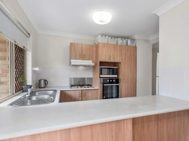 AIR-CONDITIONING TO LIVING ROOM & MASTER BEDROOM... BATH... DISHWASHER... REMOTE DOUBLE LOCK UP GARAGE... EASY ACCESS TO PUBLIC TRANSPORT…