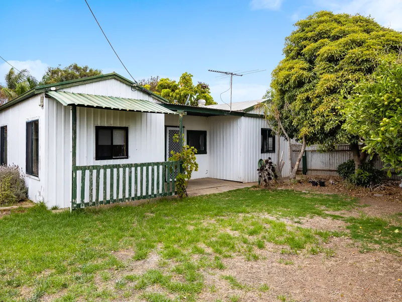 Cosy two bedroom home on large block with large shed