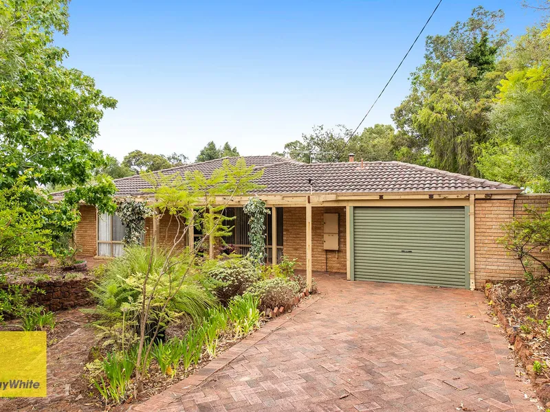 WELL-LOCATED FAMILY HOME BRIMMING WITH POTENTIAL