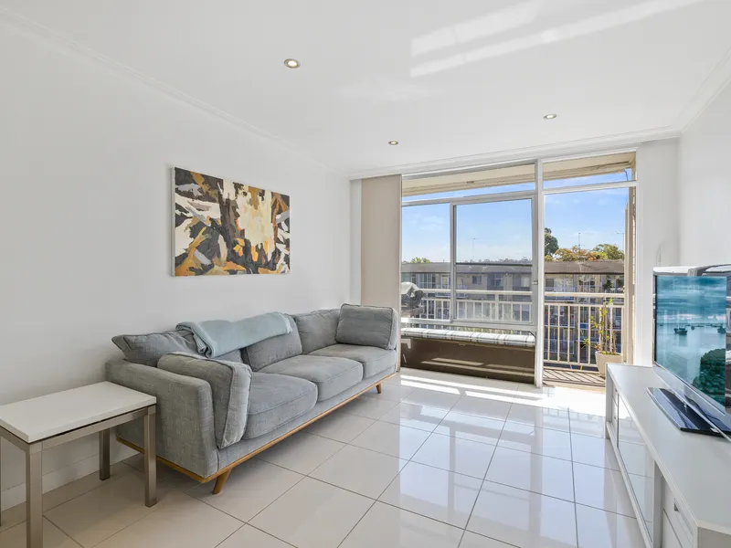 Resort Style, Modern, Updated And Sun-Kissed Executive Style Two Bedroom Apartment With Parking, Moments To Cafes, Shops And Train Station