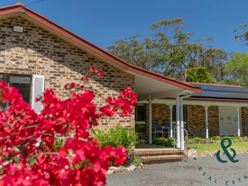 Two acre sanctuary with home, granny flat, and a block full of potential