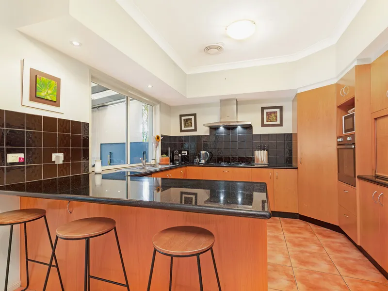 FIVE BEDROOM SINGLE LEVEL HOME IN POPULAR VARSITY LAKES ENCLAVE