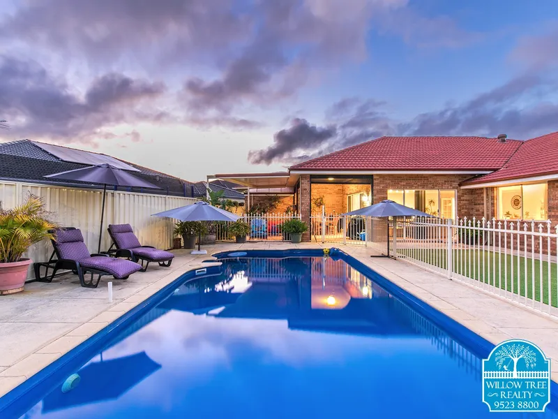 IMAGINE RELAXING IN THIS SUPER SIZED HOME WITH AN IMPRESSIVE BACKYARD! Price reduction!!!