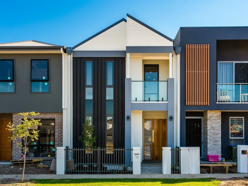 Stand out in a stylish, smart and solar-powered Torrens Title townhouse with quality at every turn...