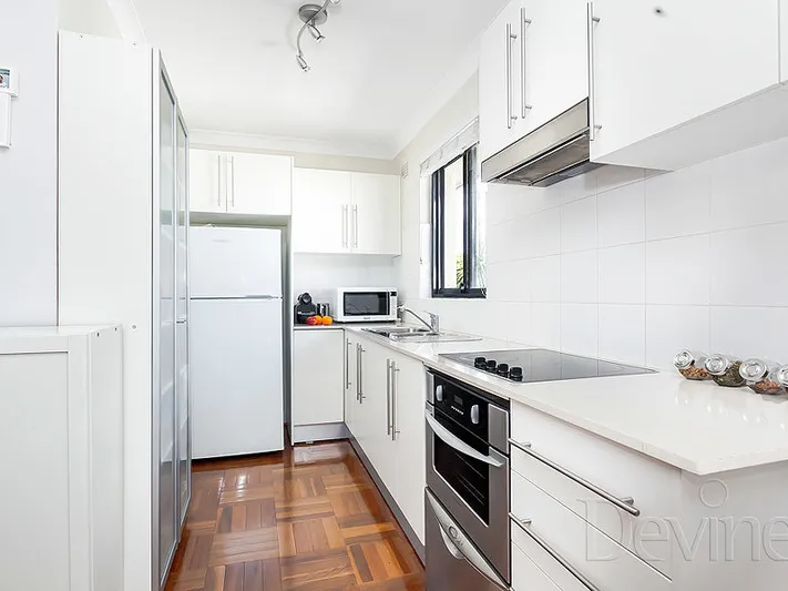 Recently Renovated, North-East Facing Two (2) Bedroom Air Conditioned Apartment in Central Location