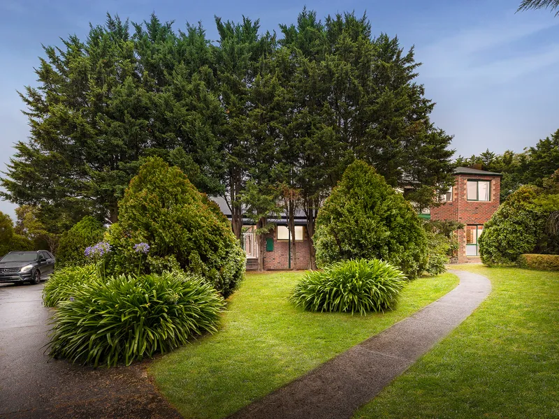 A beautifully luxurious oasis with an acre to love