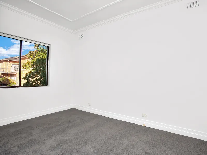 Spacious one bedroom with large sun room