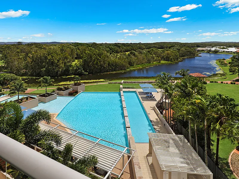 Easy Living & Investing- PELICAN WATERS RESORT