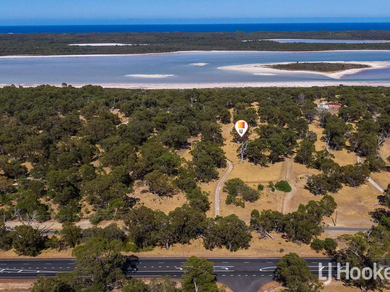 12 Acres Backing onto Stunning Lake