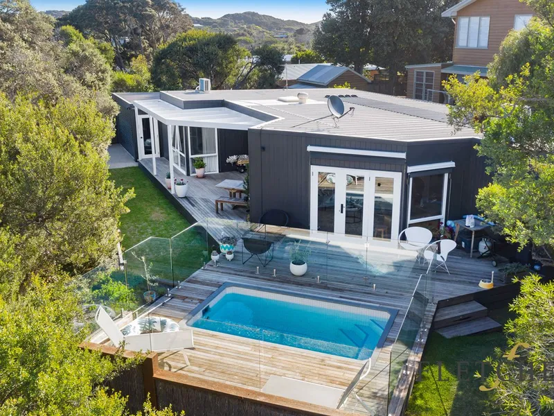 Beach House with Flair & Charm!