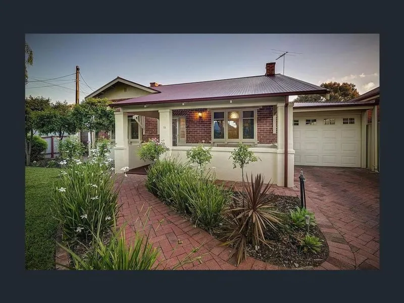 STUNNING 3 BR BUNGALOW IN BEAUTIFUL TREE LINED STREET
