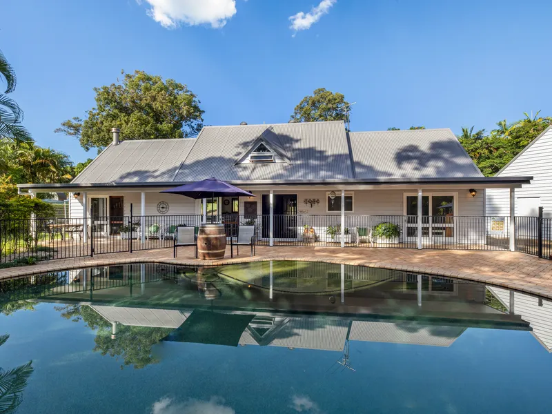 PRIME LEVEL ACREAGE With STUNNING HOME - CLOSE TO THE BEACH! A RARE OFFERING!