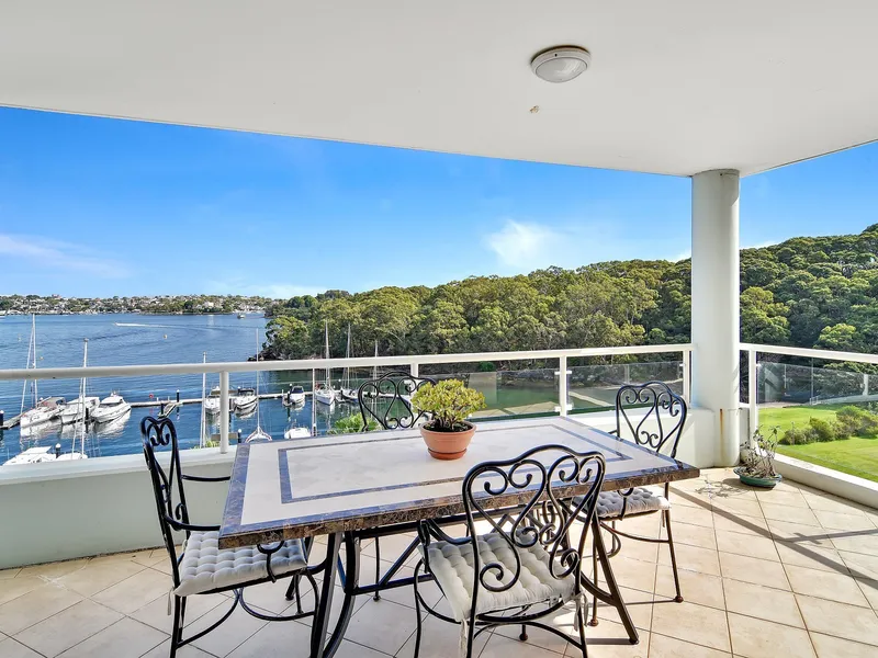 Absolute waterfront 3 bed + study in resort style setting
