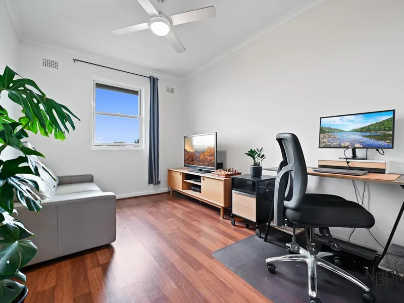 Peacefully positioned 2-bedroom apartment with shared swimming pool!