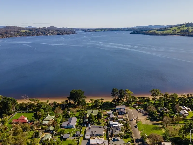 Enviable Life Style With Outstanding Water Views & Sandy Beach Access